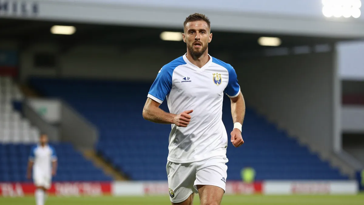 Woking Stuns Eastleigh with Late Comeback under Defoe