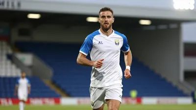 Woking Stuns Eastleigh with Late Comeback under Defoe